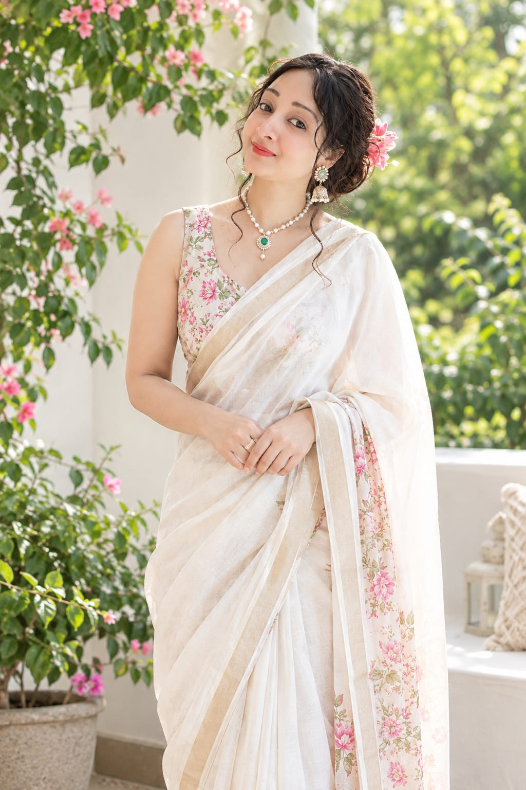 Banani Sardar, calm and transformed in a white floral saree